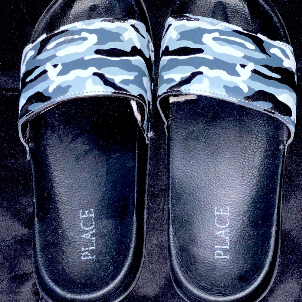 Camouflage, boy’s size 5 flip flops, gently used.